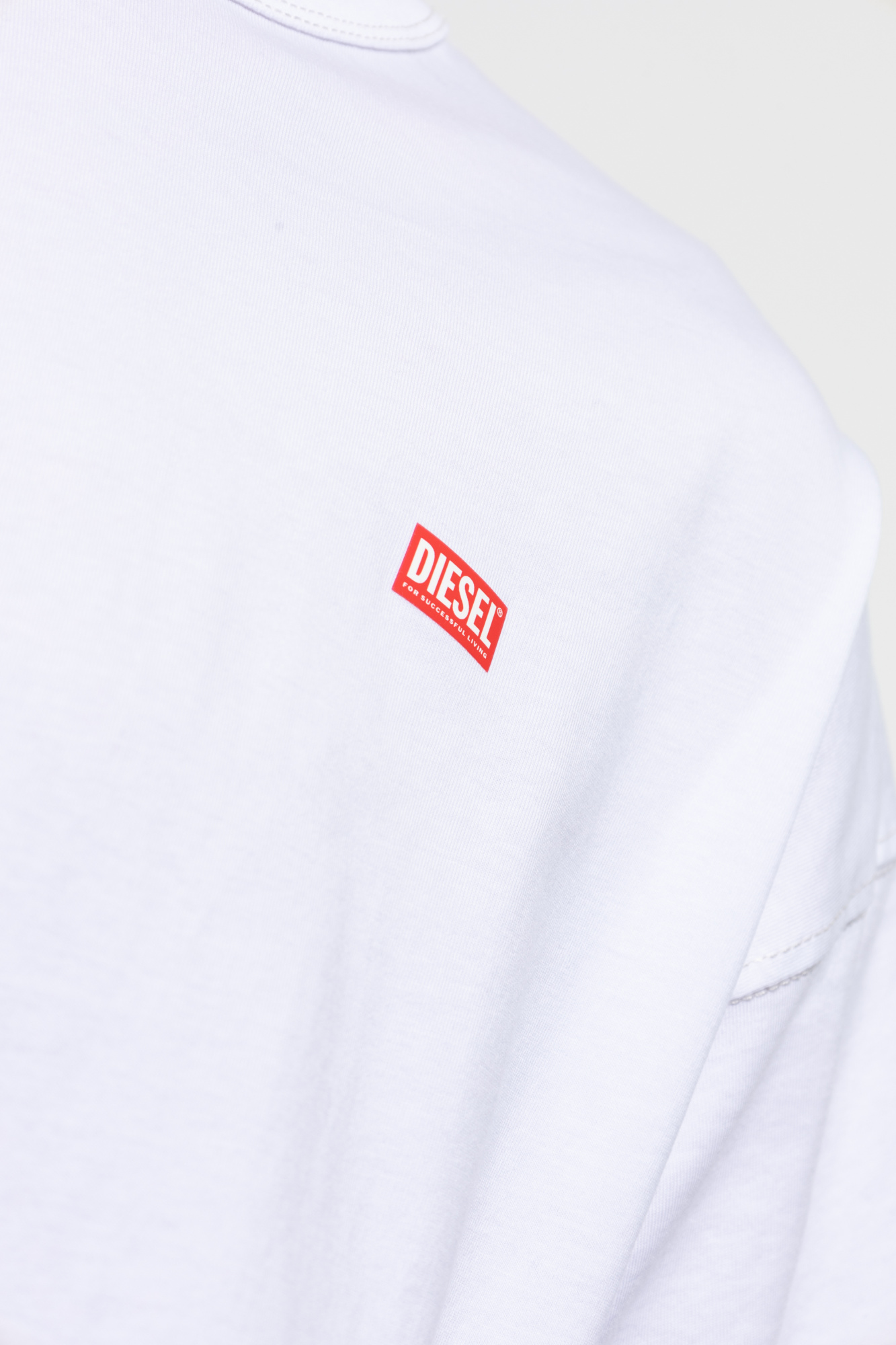 DIESEL◆Ｔシャツ レッド ホワイト Men's T-shirt with trompe l'oeil cracked print | Multicolor